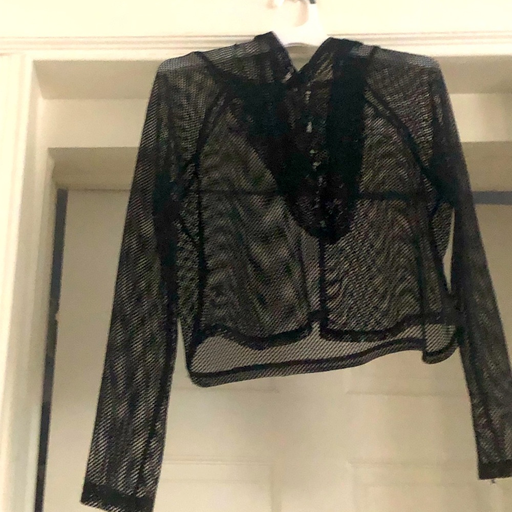 Black mesh long sleeve hooded women’s shirt.
